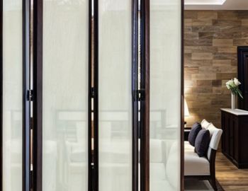 Space-saving bi-folding and stackable glass doors from Prime Glass & Aluminium – seamless indoor-outdoor transition