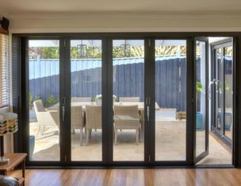 Space-saving bi-folding and stackable glass doors from Prime Glass & Aluminium – seamless indoor-outdoor transition