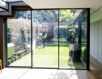 Ultra-slim sliding glass doors by Prime Glass & Aluminium – modern, smooth, and energy-efficient doors for panoramic views